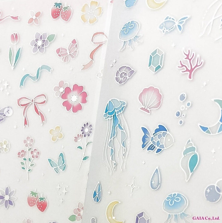 Foto en detalle de las pegatinas japonesas de lazos y meduzas con detalles de foil metalizado