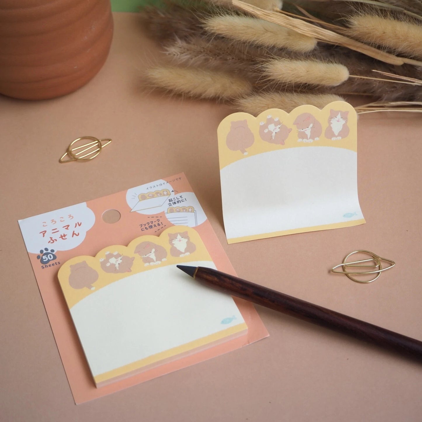 Bloc de notas japonés TSUTSUMU diseño gatito tonos naranjas