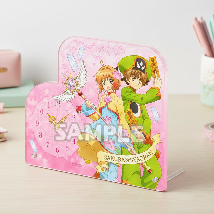 Reloj acrílico de sobremesa Bushiroad Creative Vol.2 con diseño rosa estilo anime, perfecto para escritorio y colección. Nagomi Papelería, papelería japonesa en España.