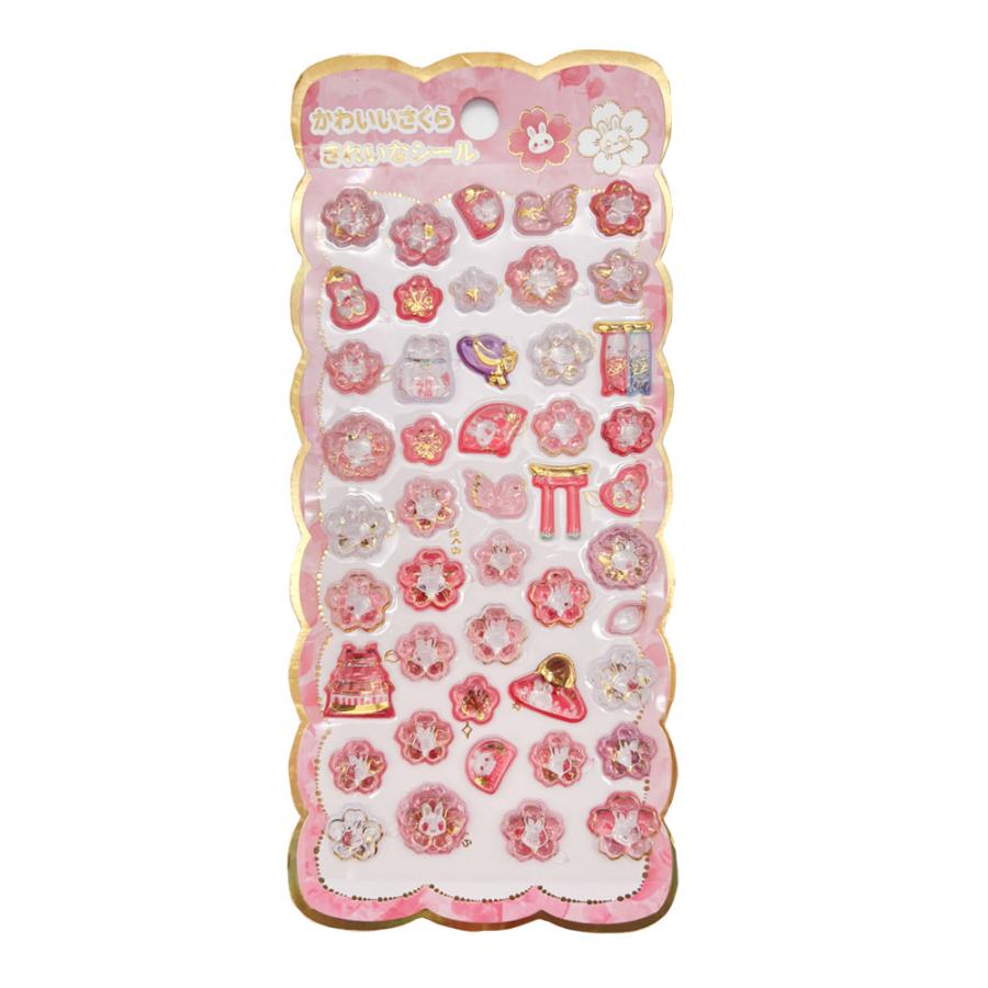 egatinas japonesas en relieve tipo “resina” con flores de cerezo y motivos kawaii, perfectas para decorar planners y regalos. Nagomi Papelería.